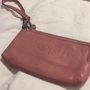 Pink leather Coach wristlet